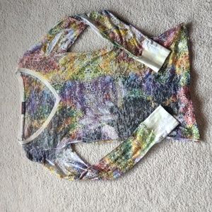 Lightweight T with V-neck. Has beaded accent on front.